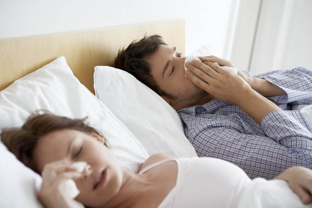 Young Couple Suffering Allergy Symptoms